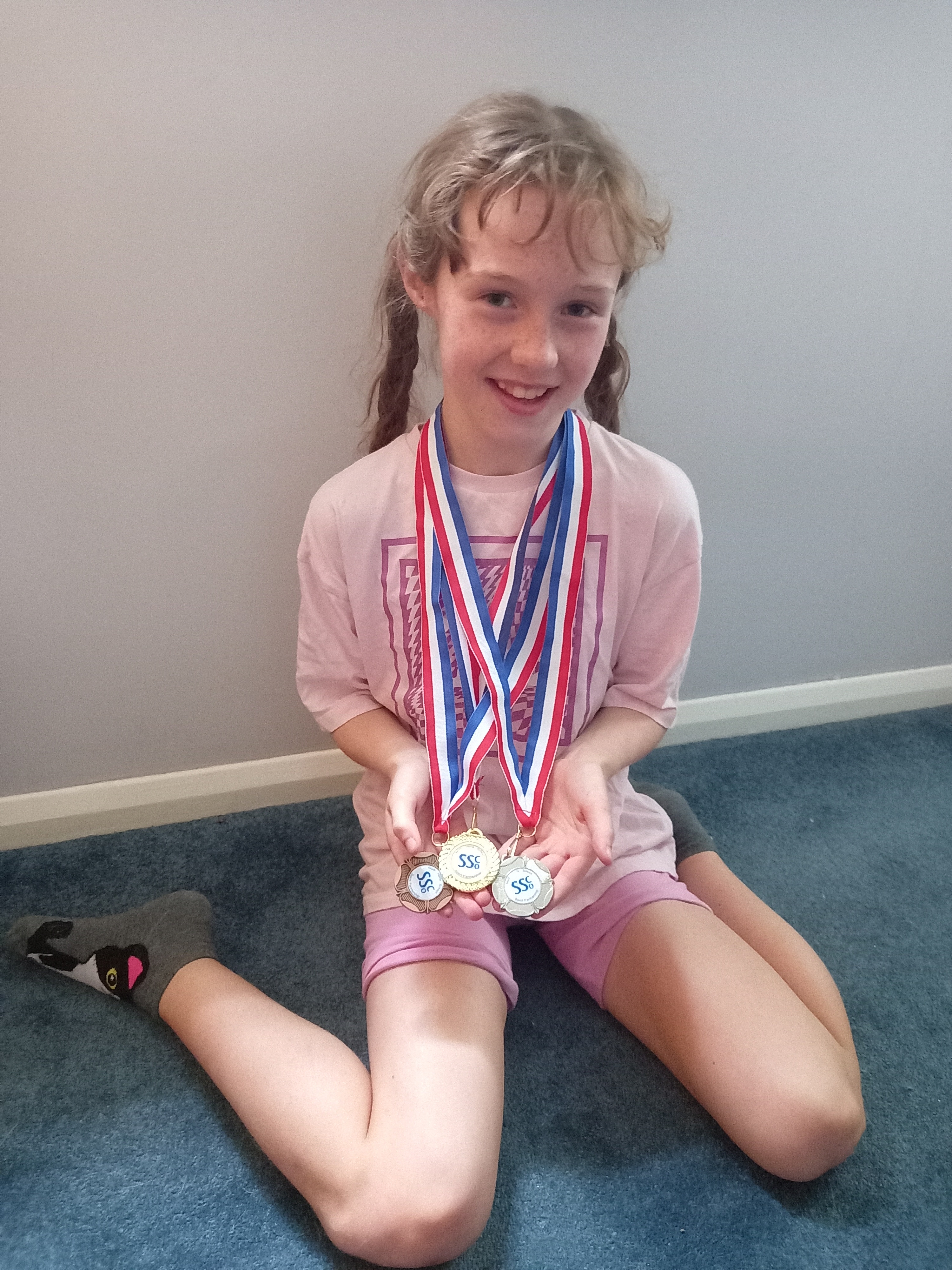 Little Bees athlete Theia wins three medals at schools district competition